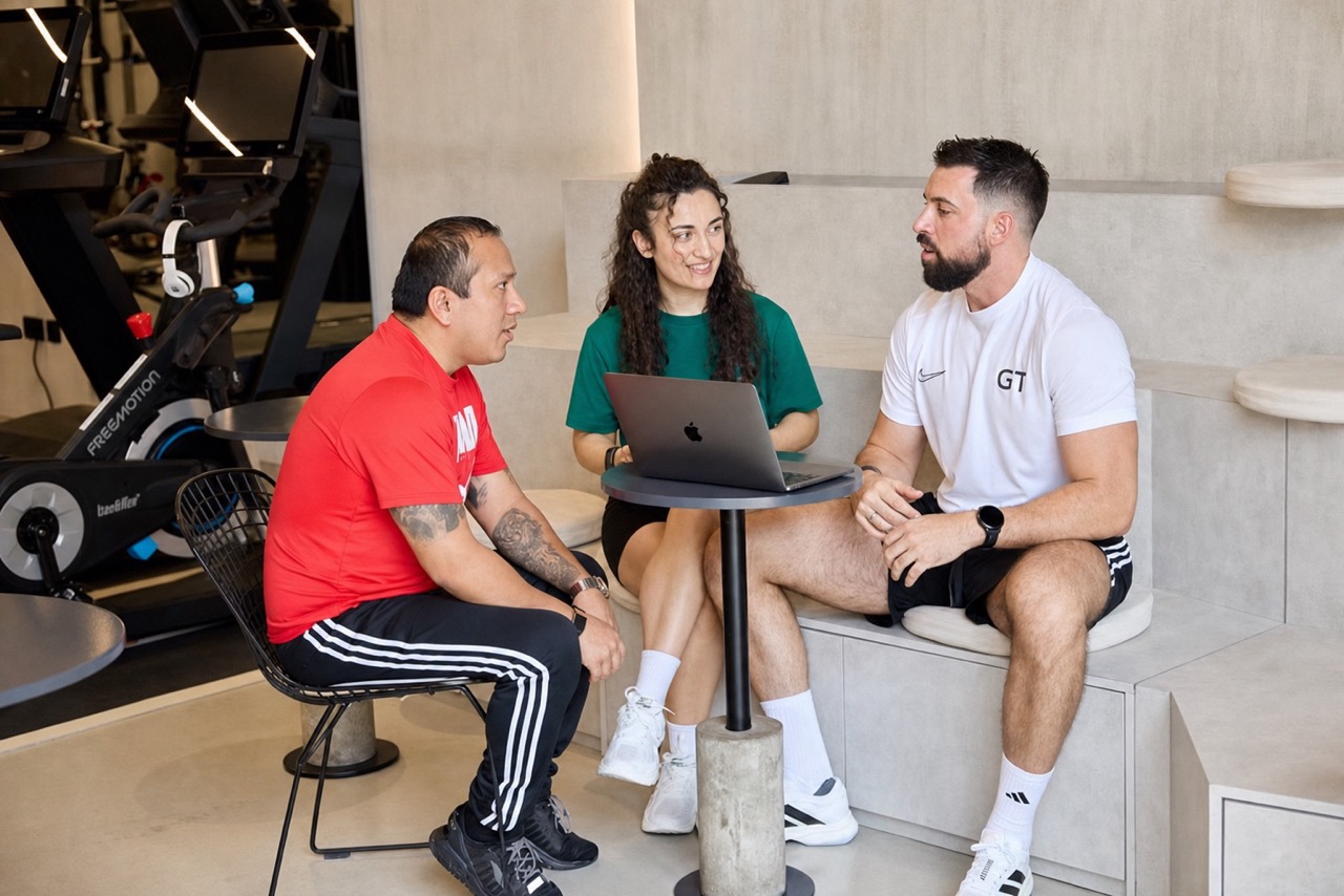 A coaching conversation with two clients